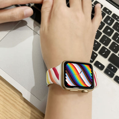 Silikonarmband „Rainbow Twist” für Apple Watch
