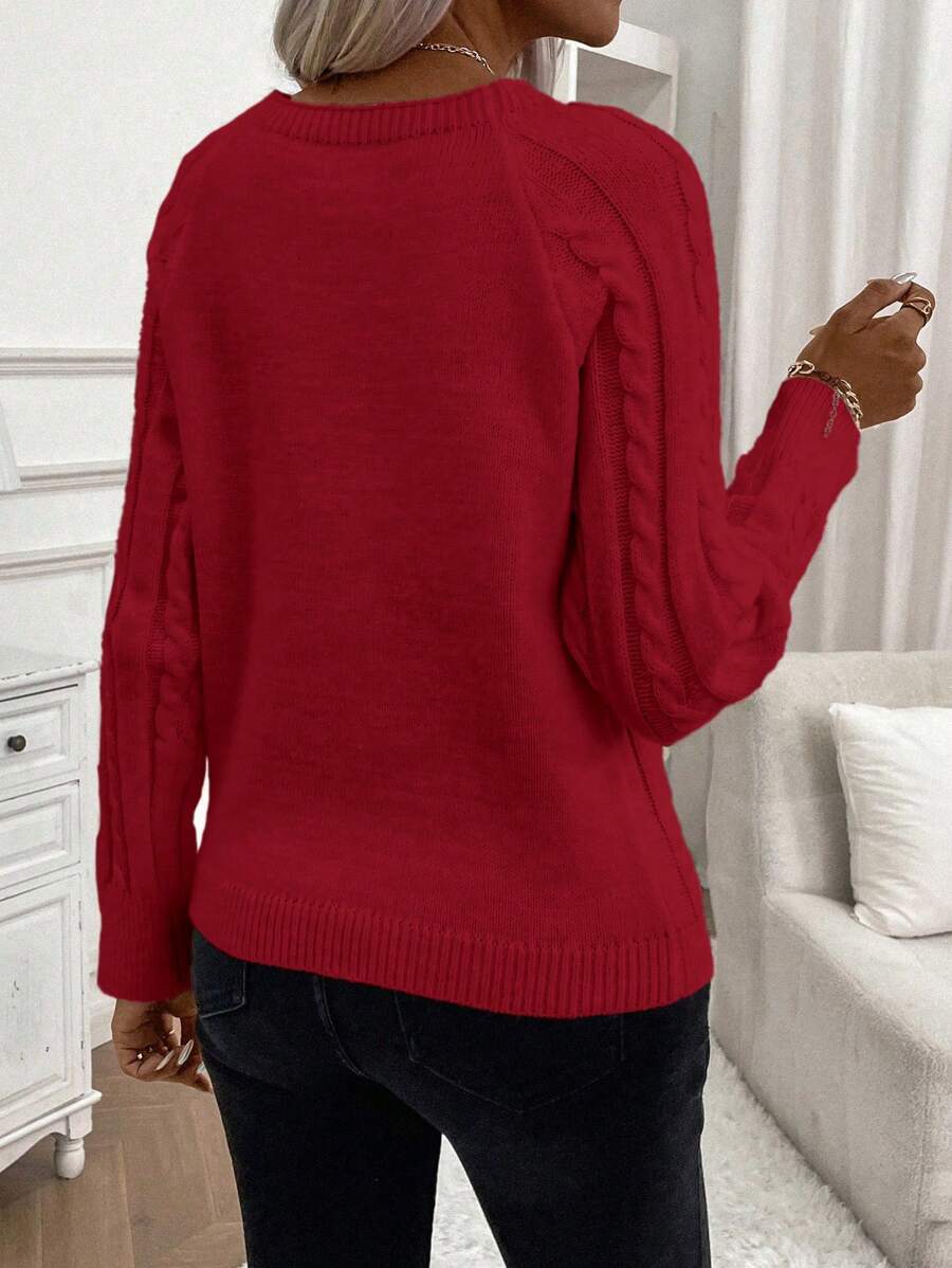 Clara – Zopfmuster-Strickpullover mit Knopfdetails