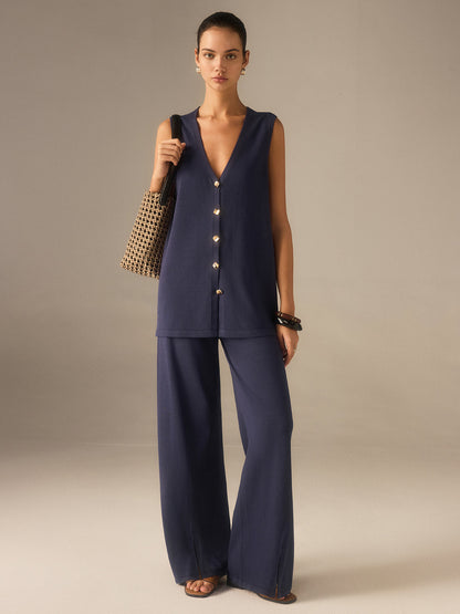 Goldenes Knopf Strickweste Hosen Set