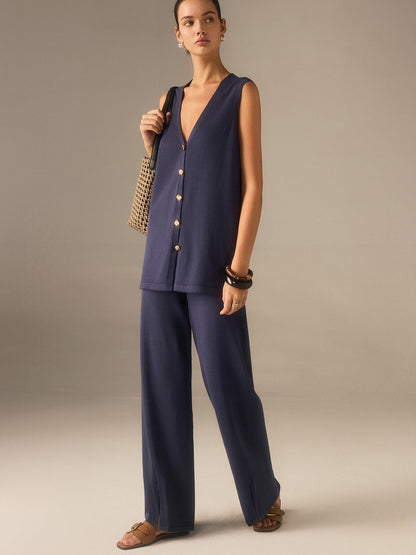 Goldenes Knopf Strickweste Hosen Set